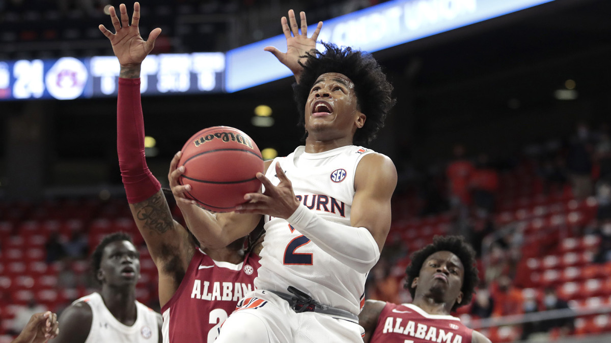 Auburn Tigers guard Sharife Cooper takes a shot against the Alabama Crimson
